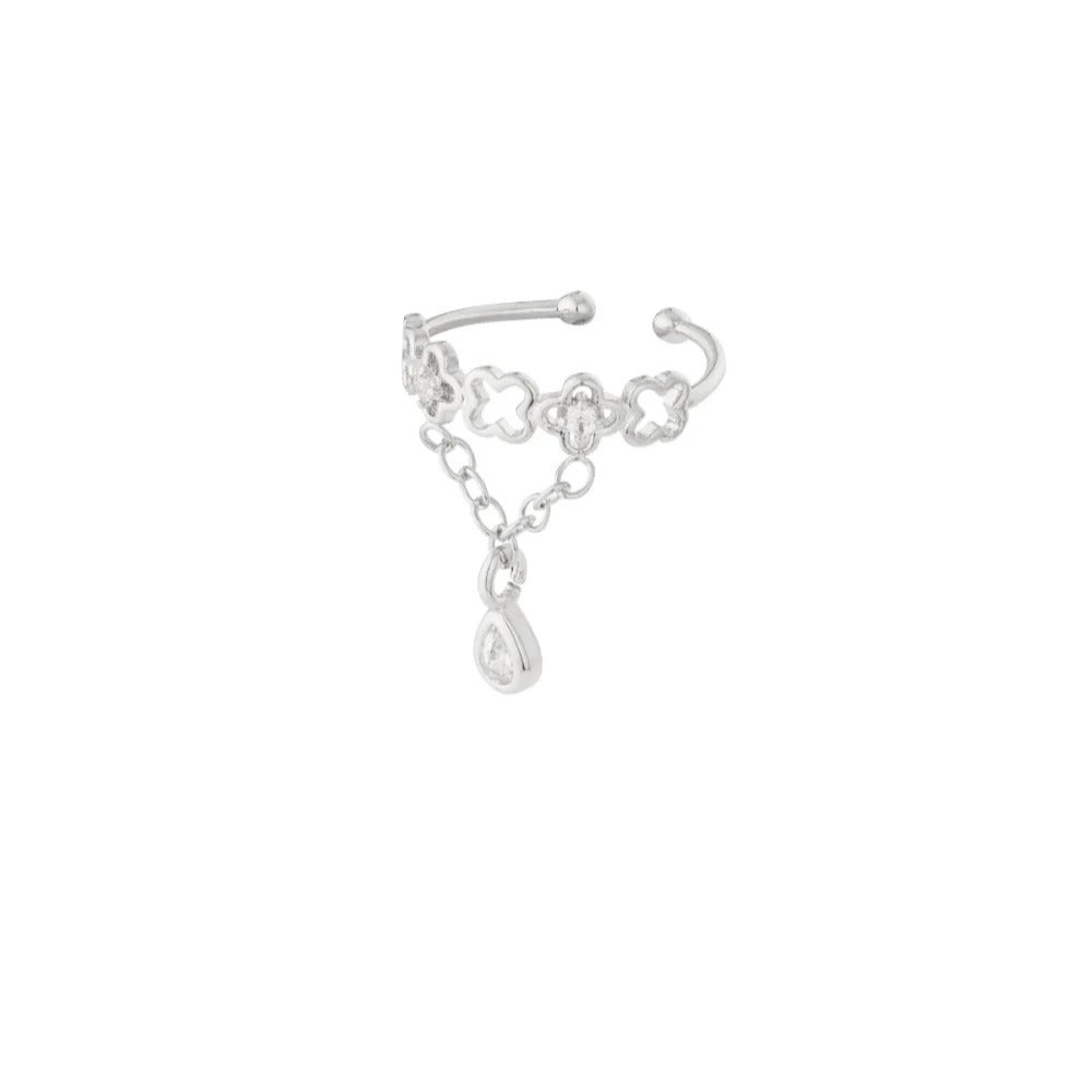 FRENCH RIVIERA Fleur de Chance kullanvärinen ear cuff -korvakoru, jossa apilamaiset kuviot ja riippuva kristallipisara.