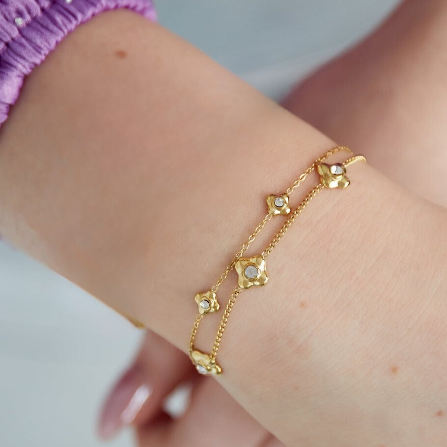 FRENCH RIVIERA | Fleurine flower-adorned surgical steel bracelet (gold)
