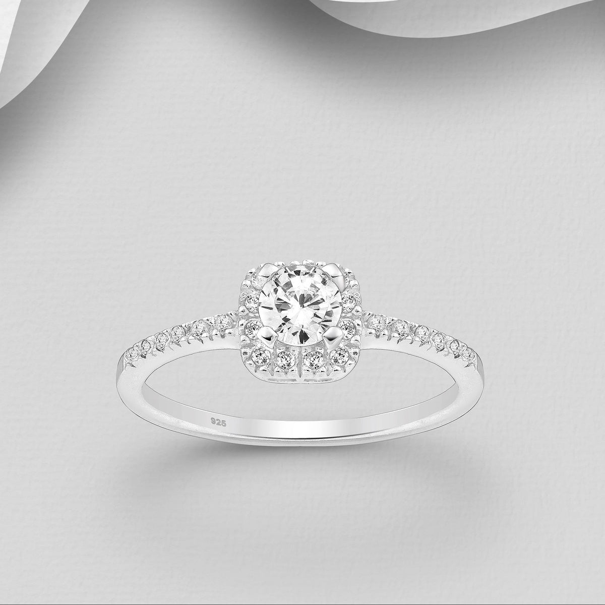 Elegantti hopeinen halo-sormus kirkkailla kivillä – Annelise.
