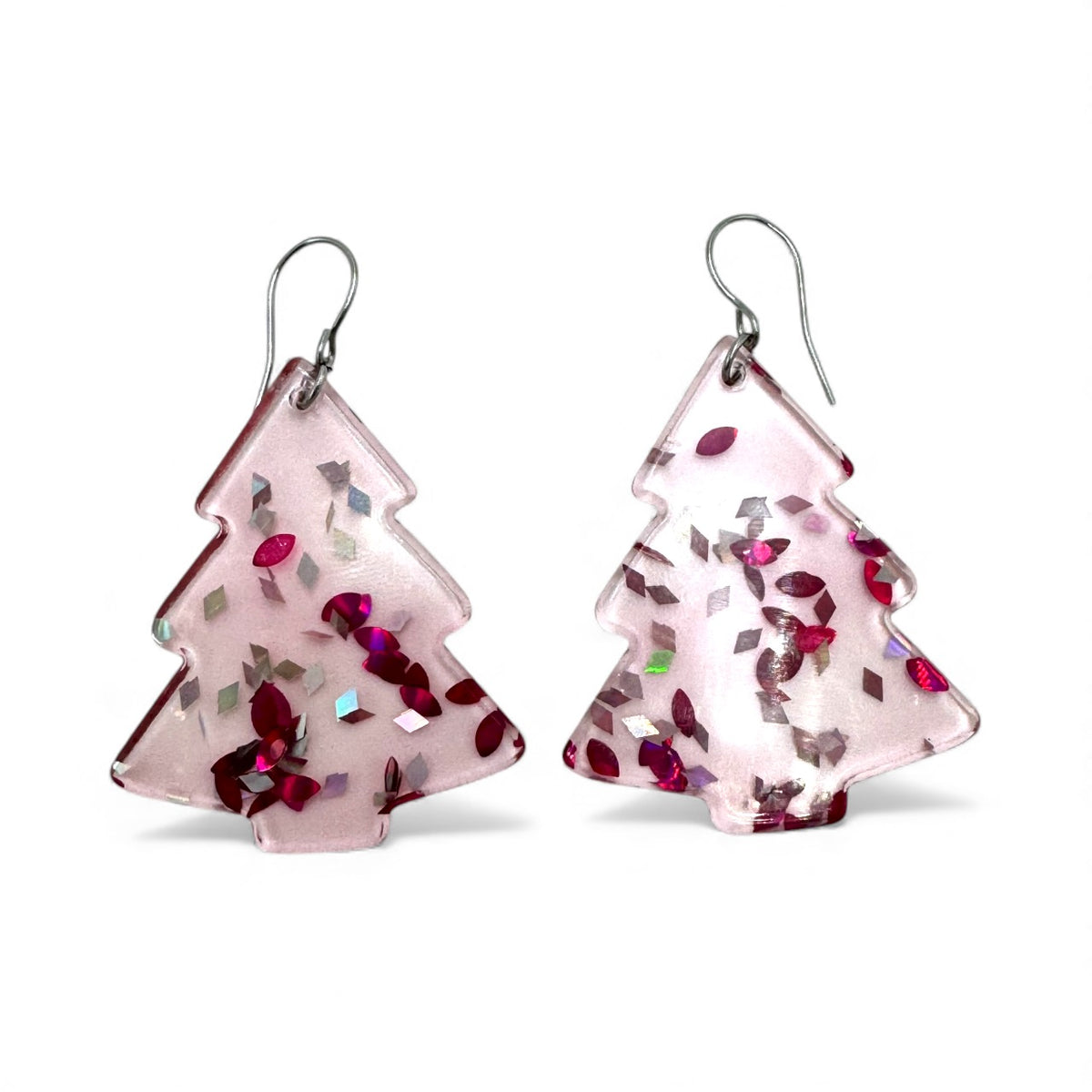 Pink Sparkle Tree korvakorut – kevyet vaaleanpunaiset joulukuuset, joissa kimaltelevia koristehileitä.